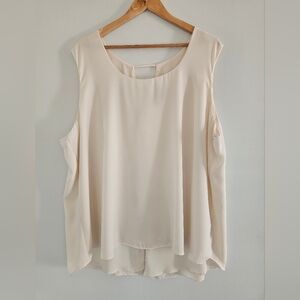 Elegant Cream Sleeveless Top With Detailed Back